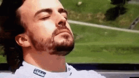 Fernando Alonso taking a break from his trying time at McLaren with a spot of sunbathing.