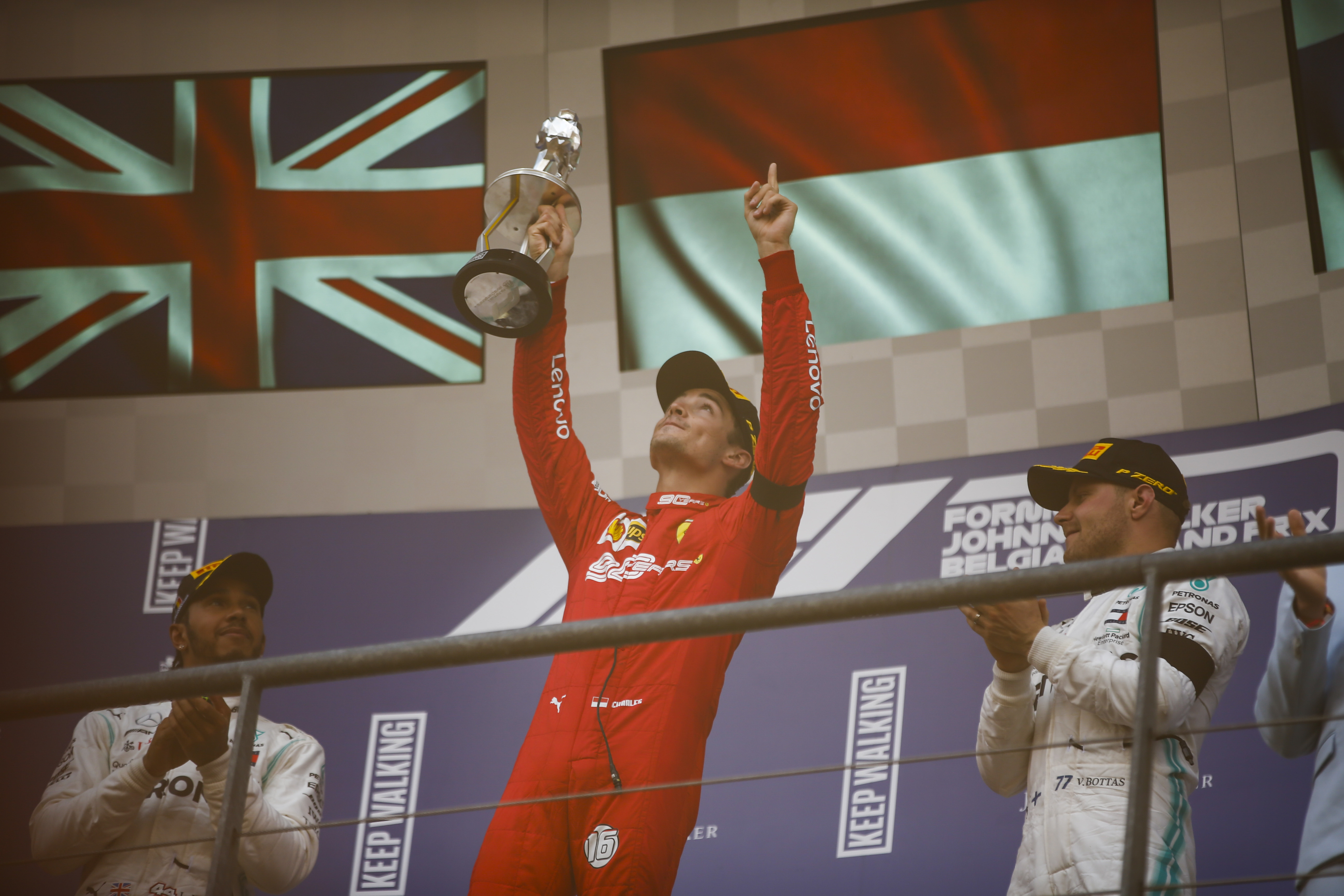 Charles Leclerc points to the heavens after winning the Belgian Grand Prix.