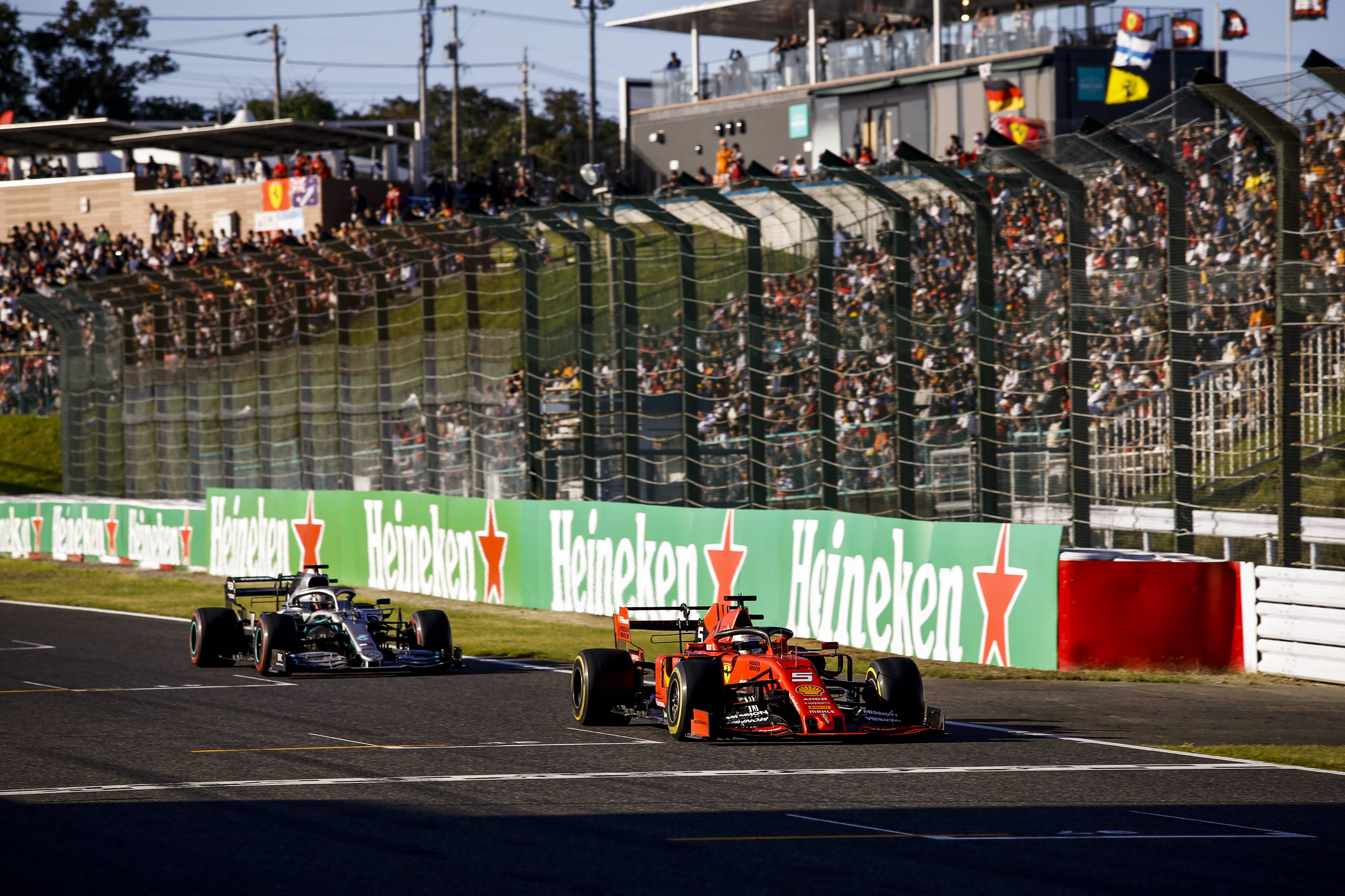Sebastian Vettel and Lewis Hamilton at the Japanese Grand Prix.
