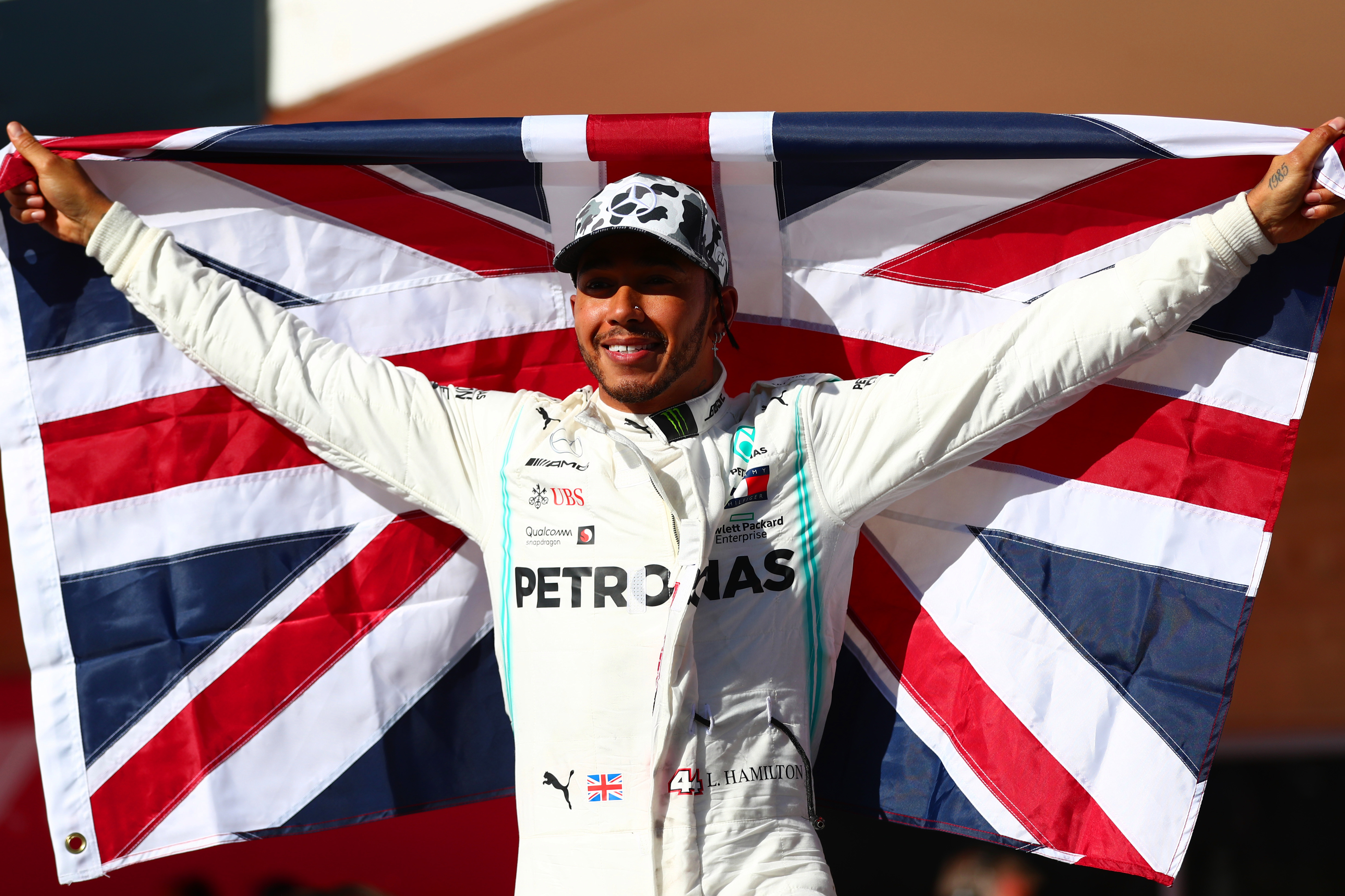 Lewis Hamilton celebrates with a Union Jack in 2019.