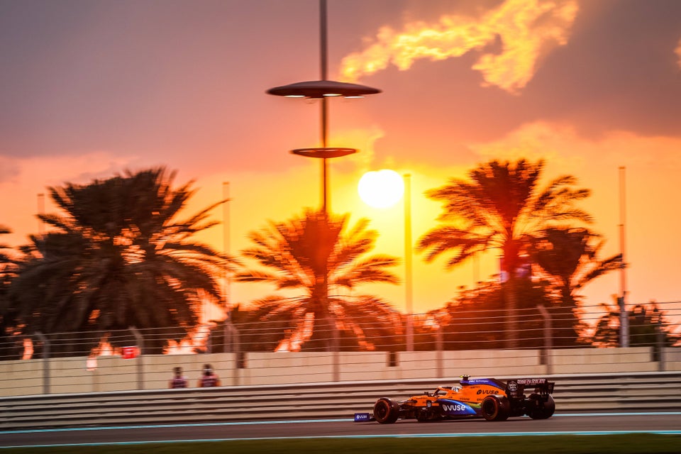 The sun sets on Lando Norris at the Abu Dhabi Grand Prix.