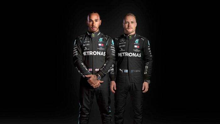 Lewis Hamilton and Valtteri Bottas pose for a Mercedes promo.