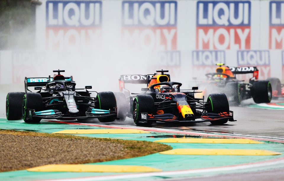 Max Verstappen and Lewis Hamilton go wheel-to-wheel at the first corner of the Emilia Romagna Grand Prix.