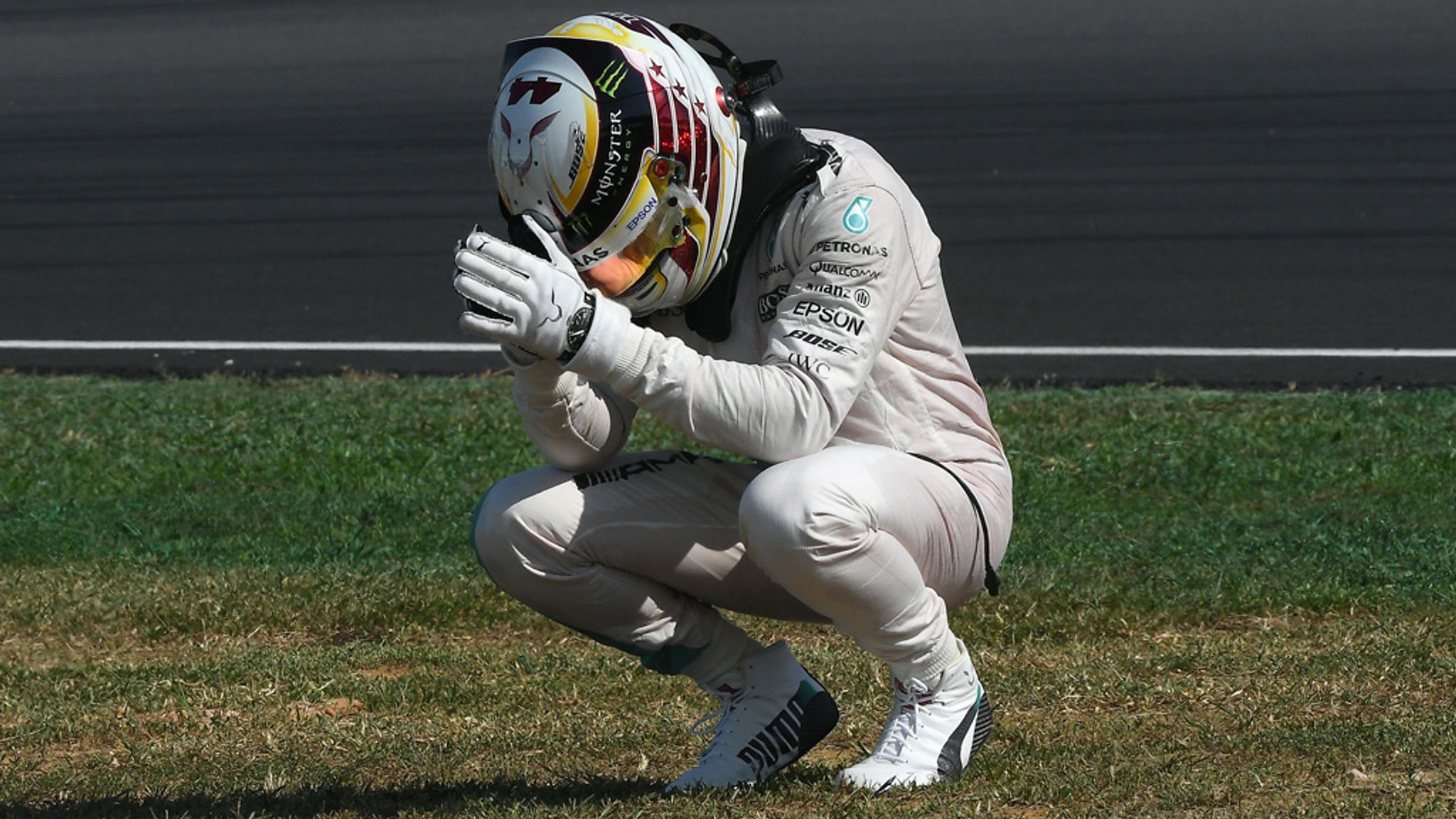 Lewis Hamilton can't believe his bad luck as his engine blows up at the 2016 Malaysia Grand Prix.