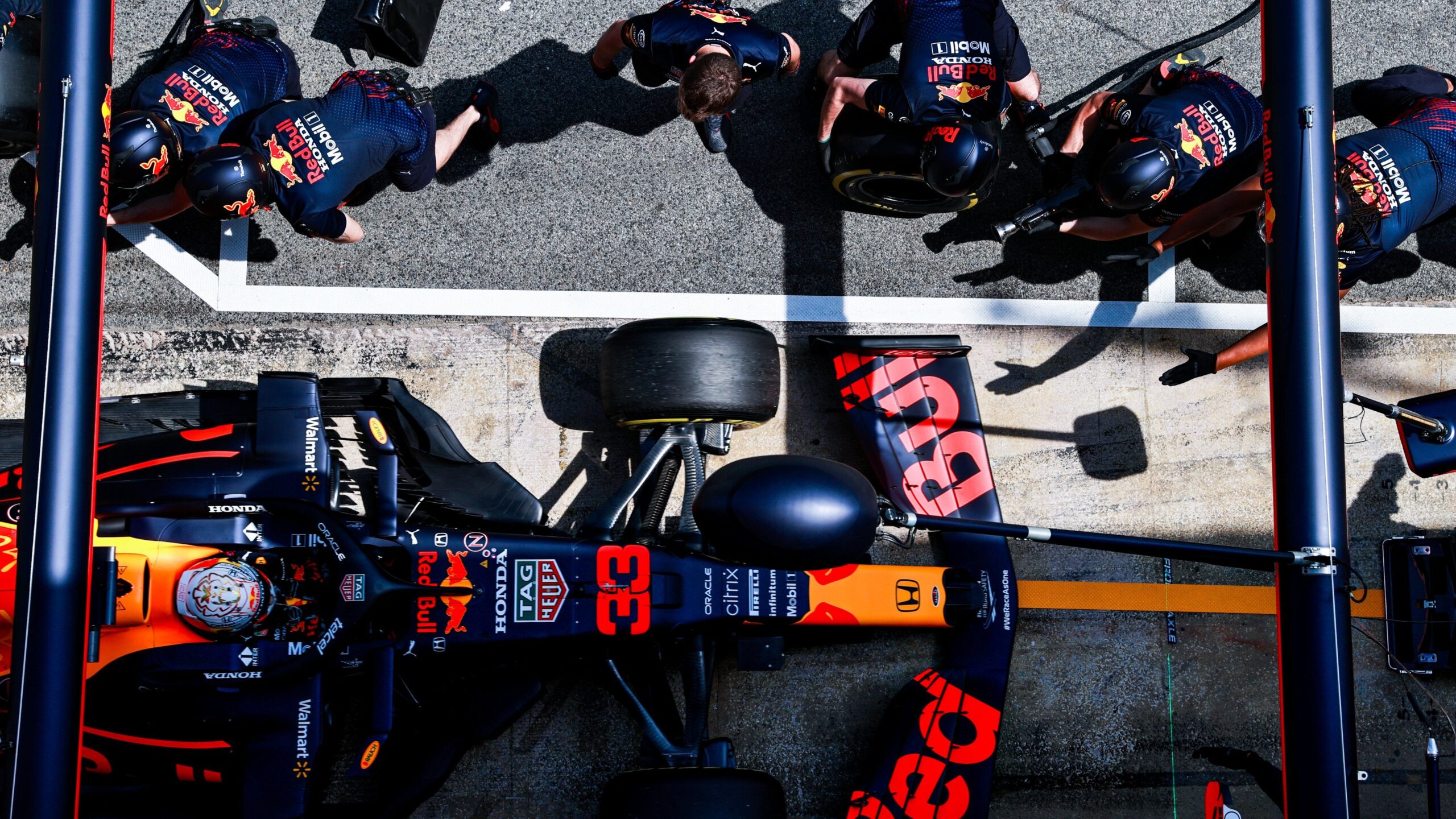 An overhead view of a Red Bull pit stop.