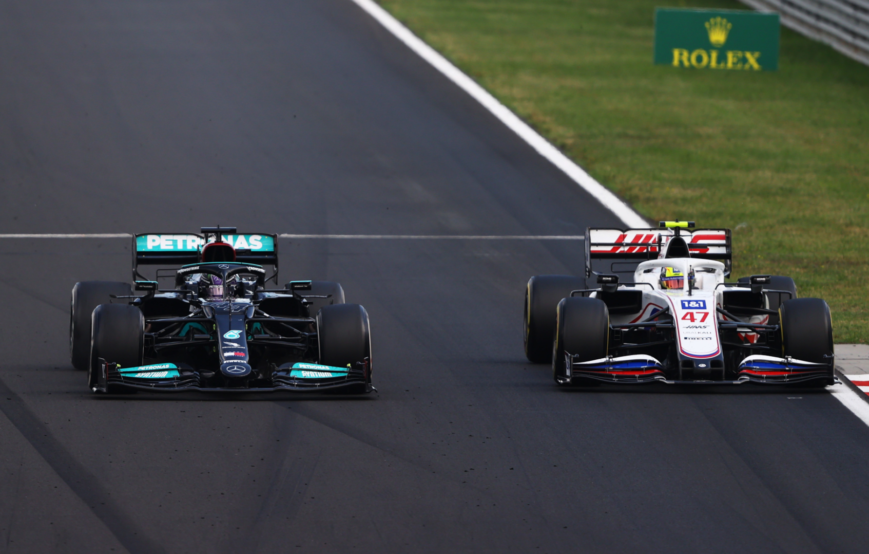 Lewis Hamilton overtakes Mick Schumacher.