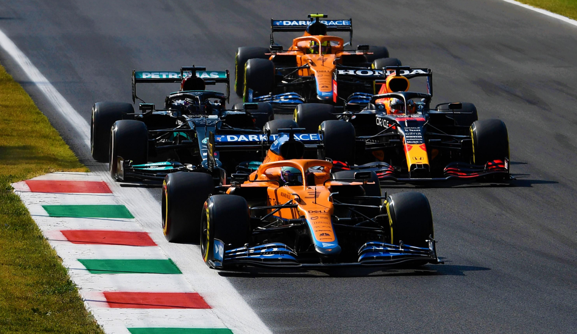 The two McLarens and the two title rivals battle.