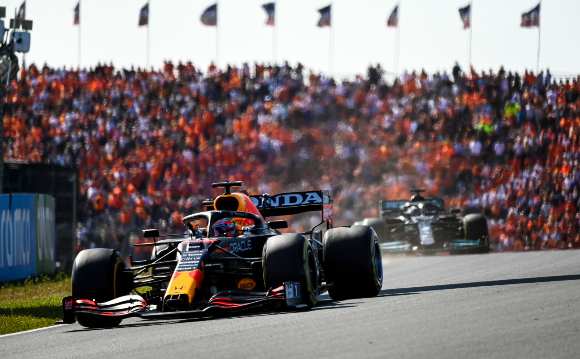 Lewis Hamilton chases Max Verstappen.