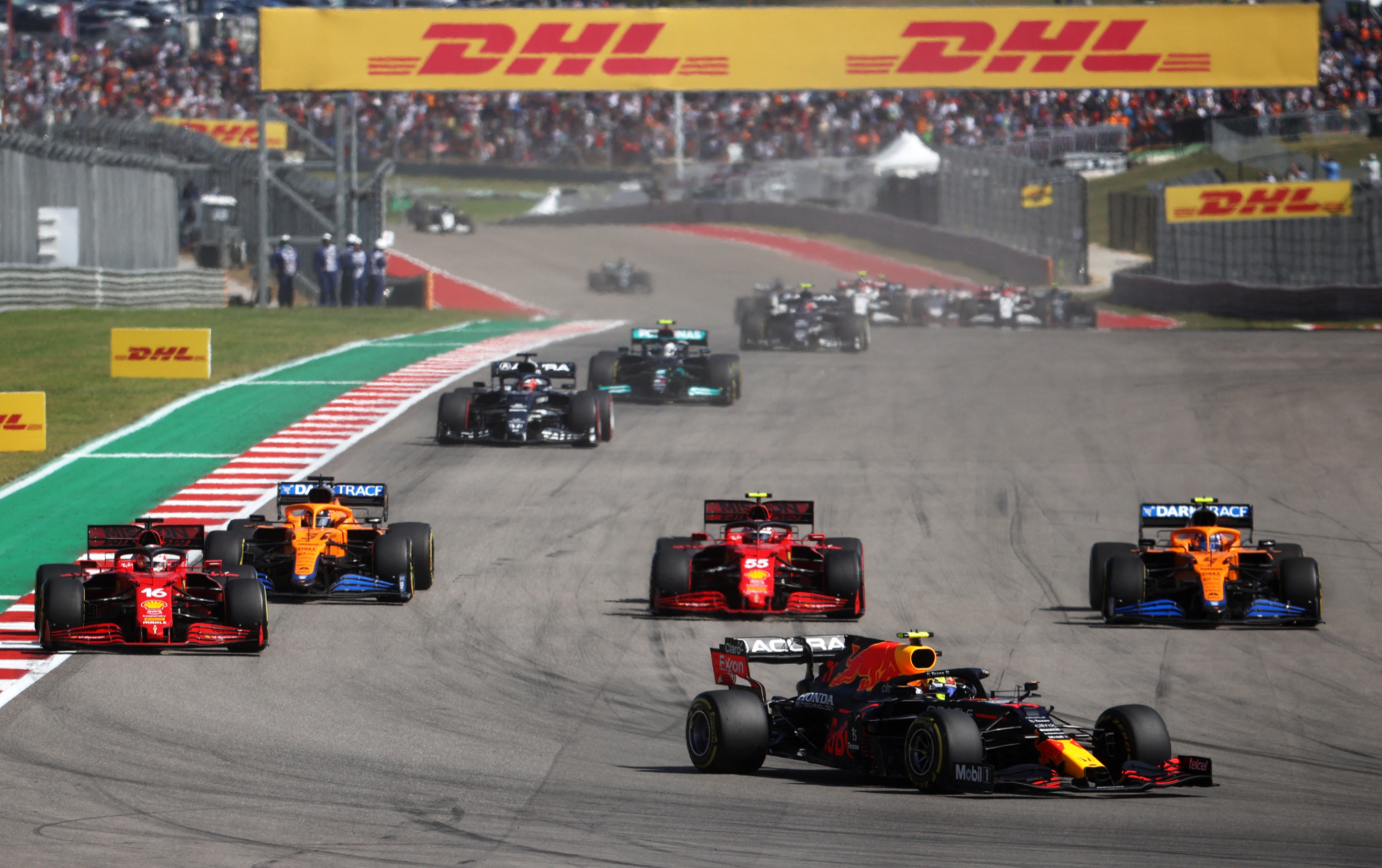 The Ferraris and McLarens go three- if not four-wide.